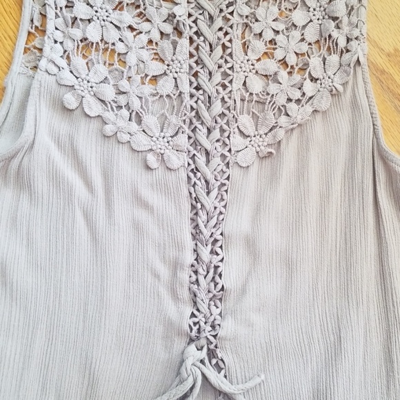 Unique sleeveless top with lace up back. - Picture 4 of 8